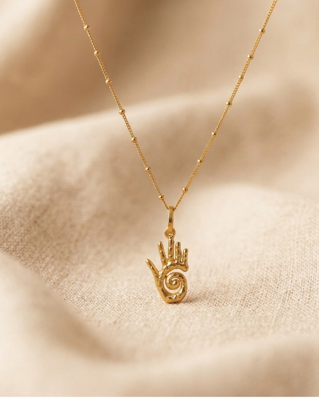 Gold Hand Pendant