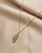 Gold Hand Pendant