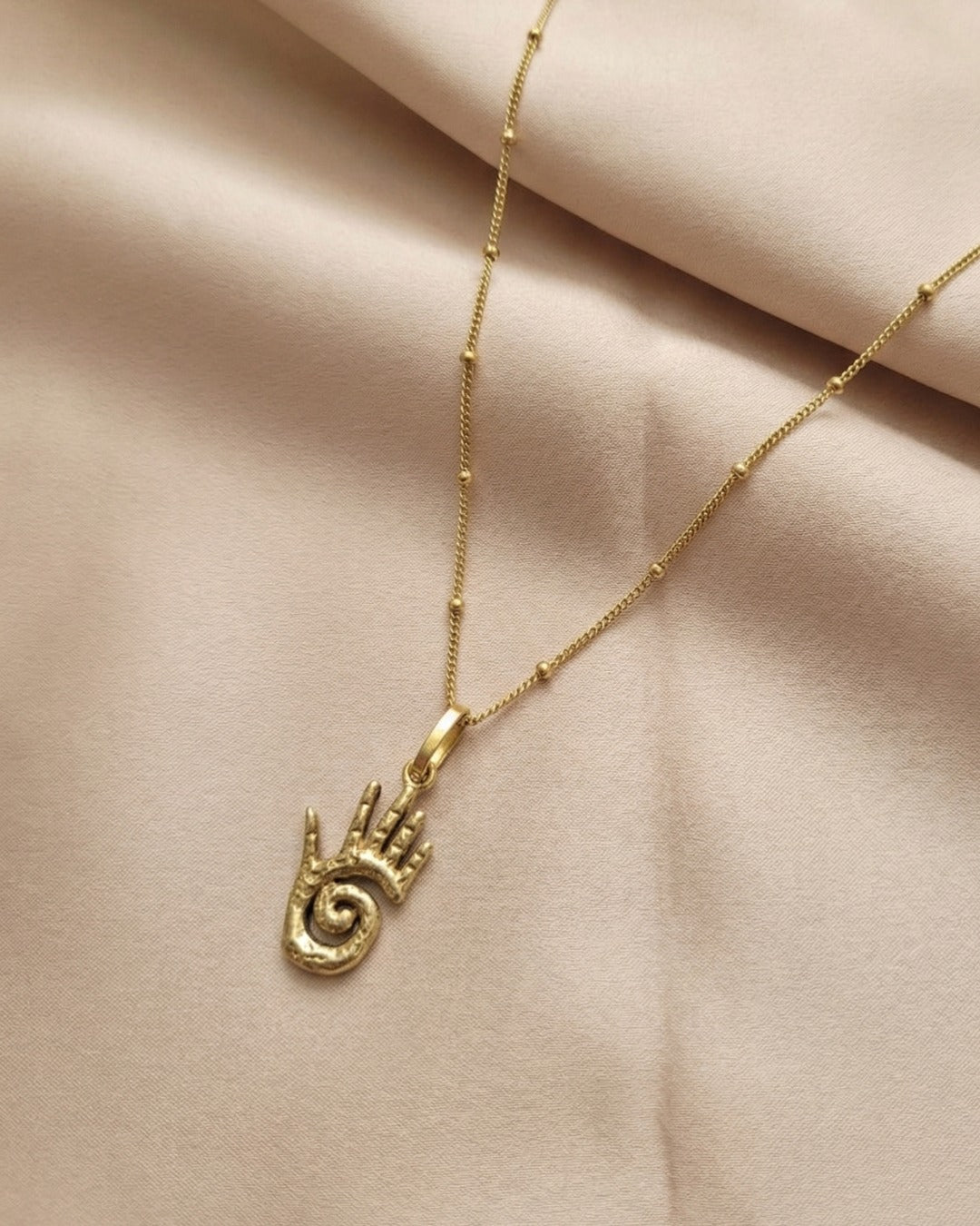 Gold Hand Pendant