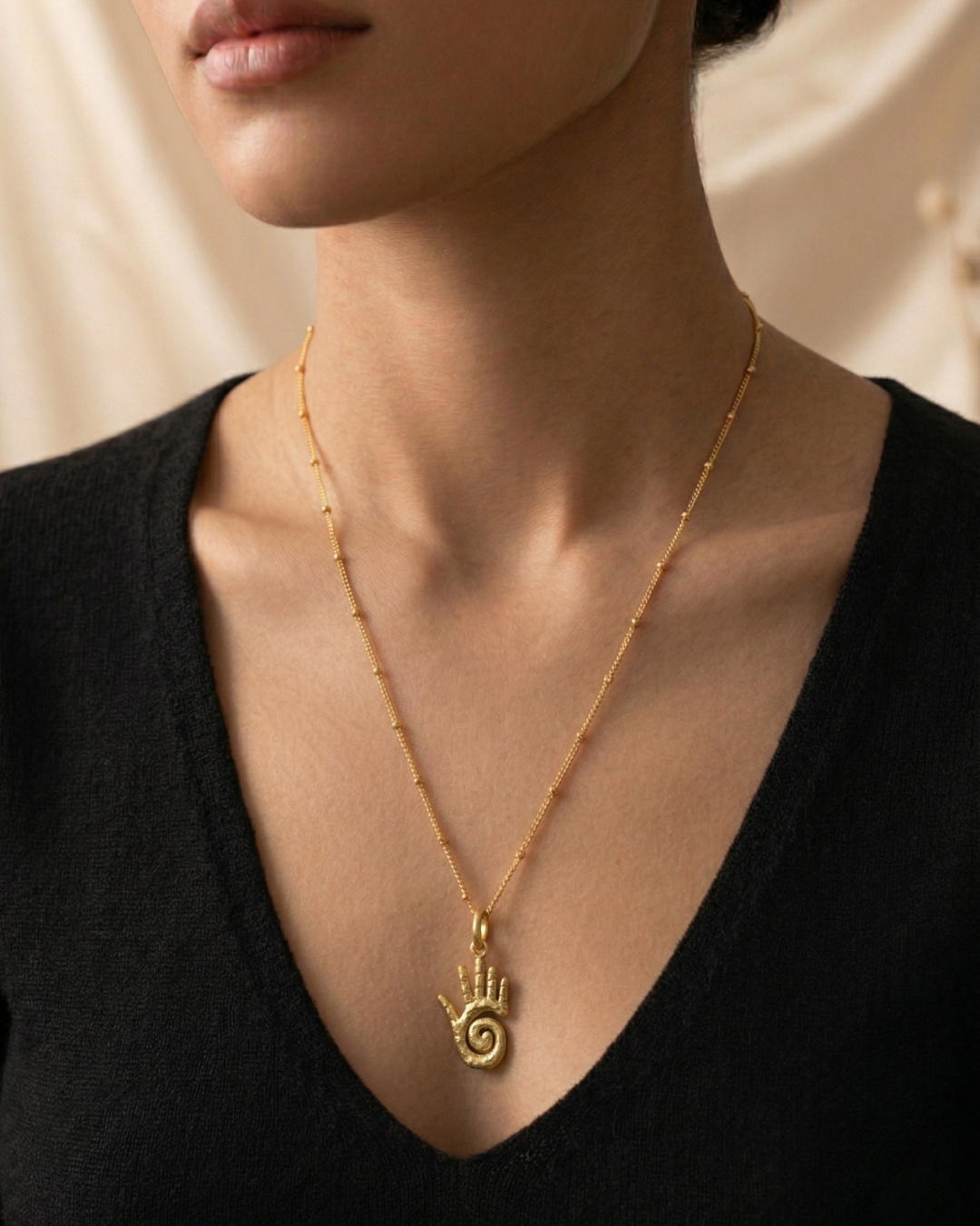 Gold Hand Pendant